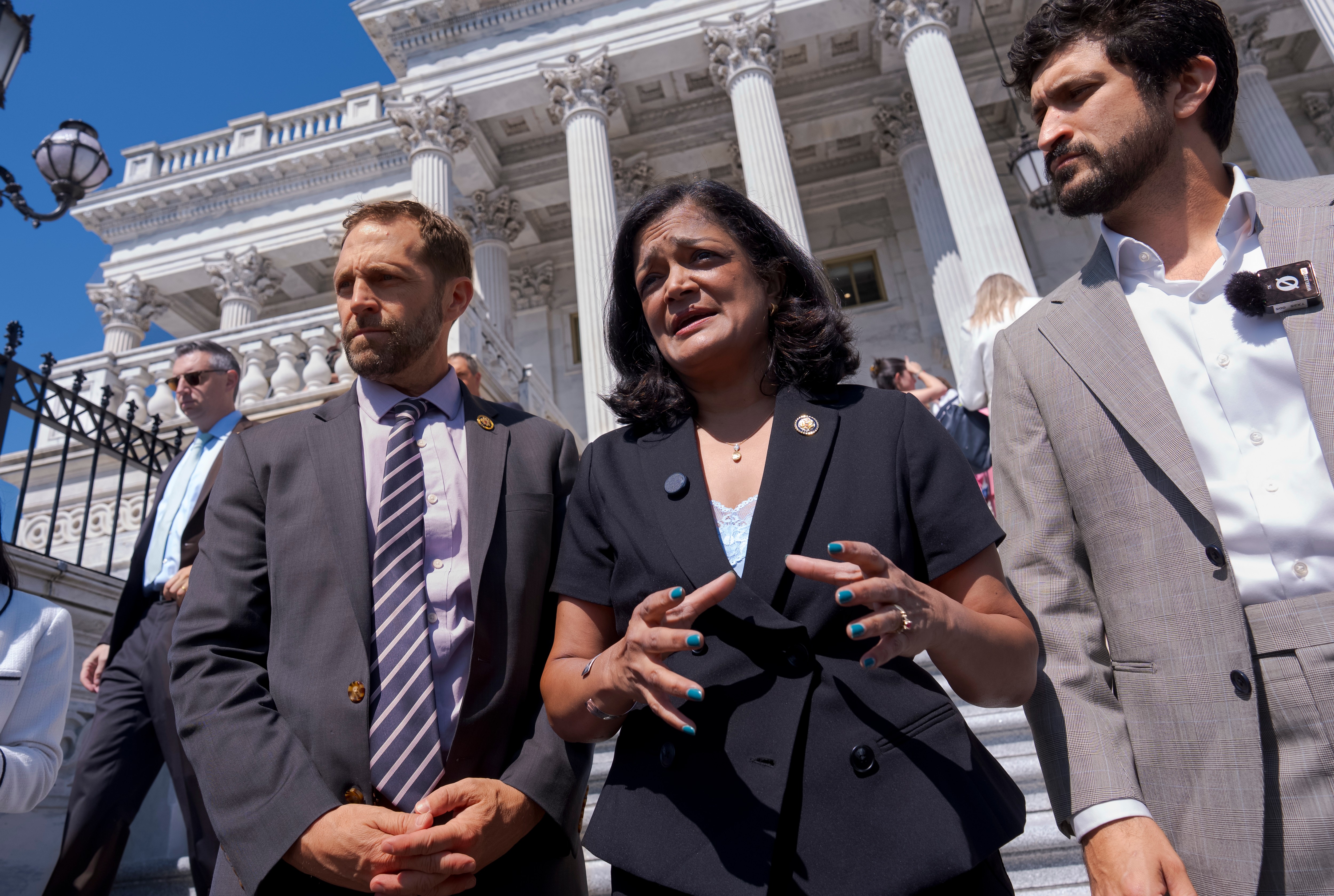 From left, Rep. Jason Crow, D-Colo., Rep. Pramila Jayapal, D-Wash., and Rep. Greg Casar, D-Texas
