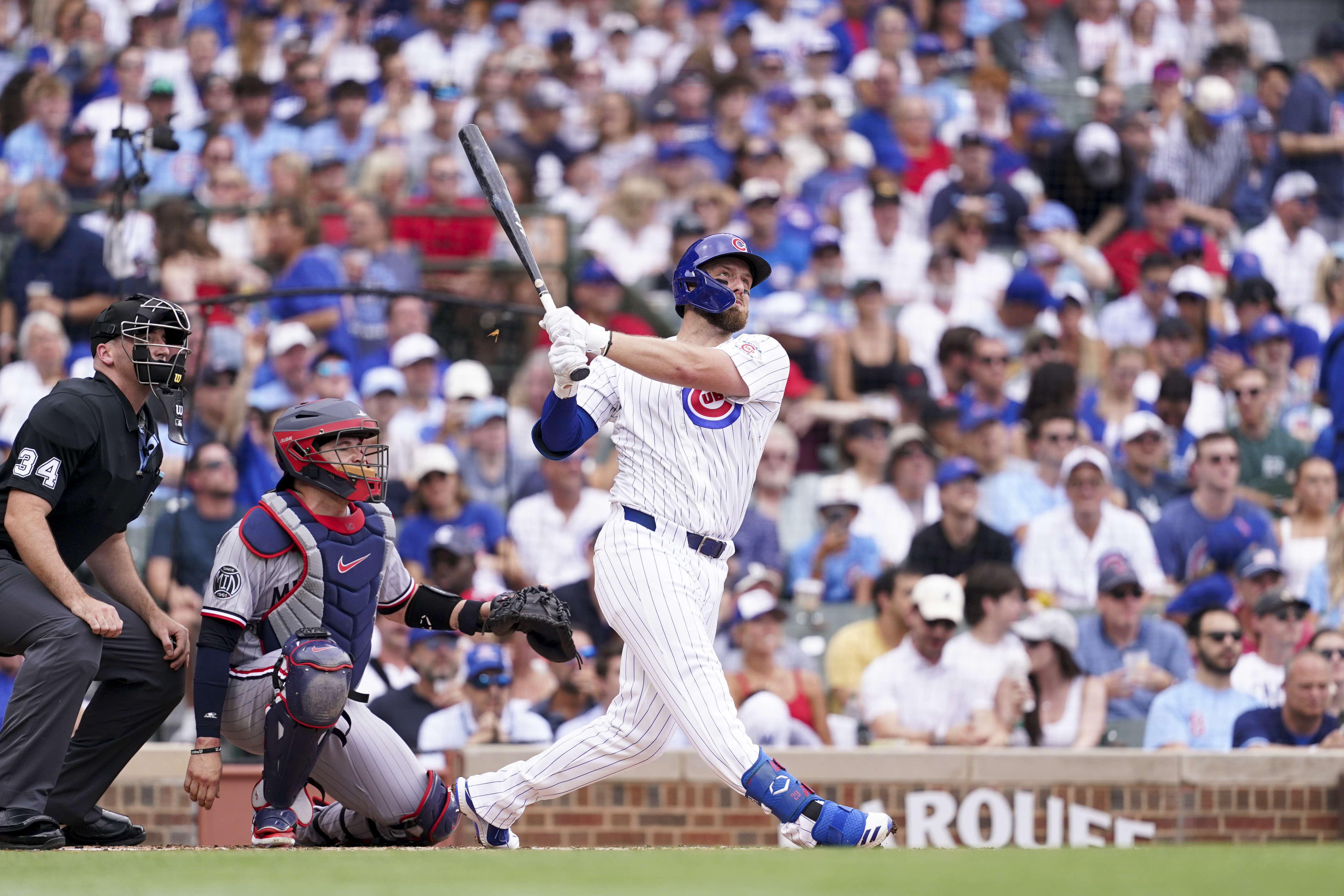 Former Cubs player Anthony Rizzo snares Michael Busch's home run ball in the Wrigley Field bleachers