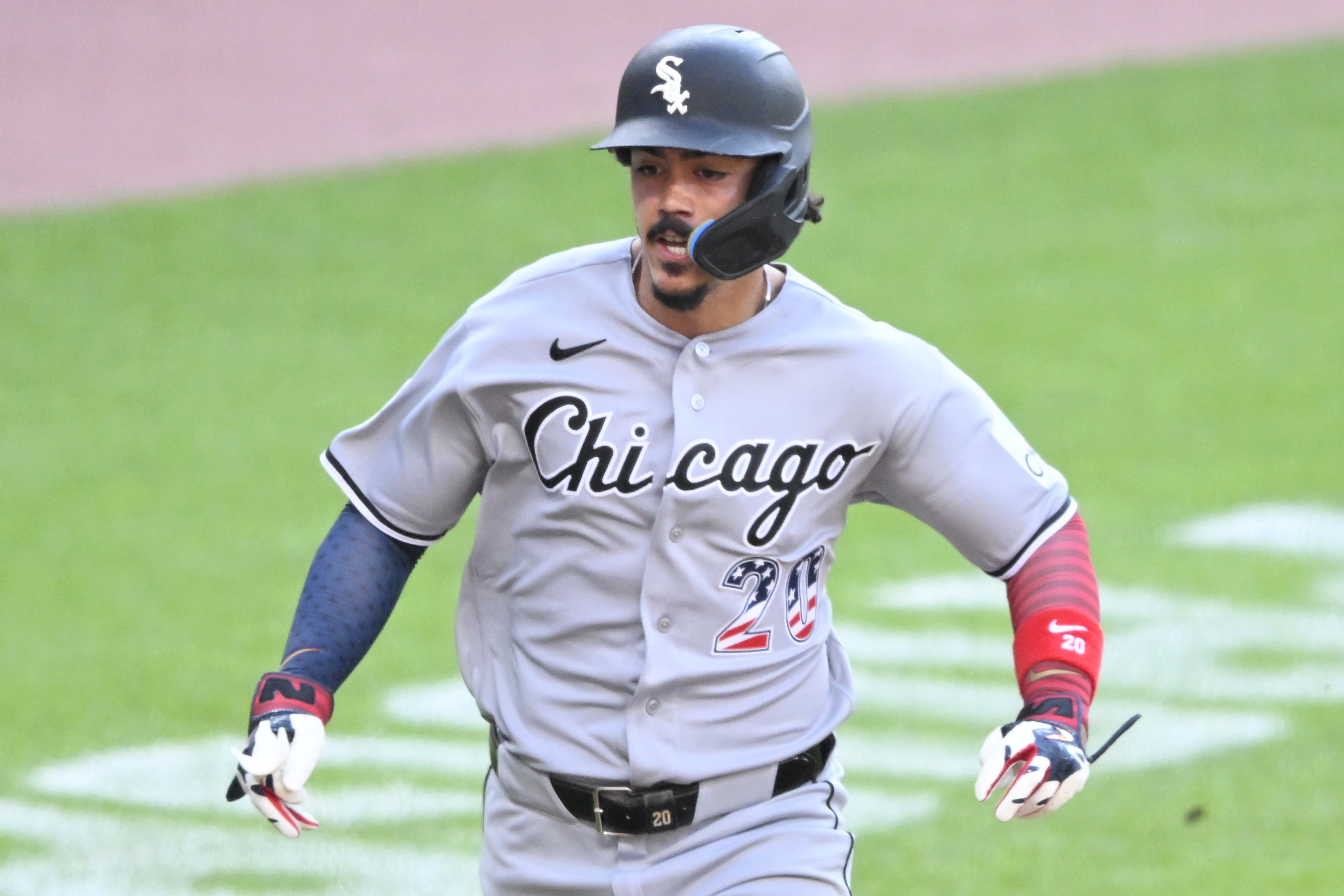 Jul 4, 2026; Cleveland, Ohio, USA; Chicago White Sox first baseman Miguel Vargas (20) scores in the first inning against the Cleveland Guardians at Progressive Field. Mandatory Credit: David Richard-Imagn Images