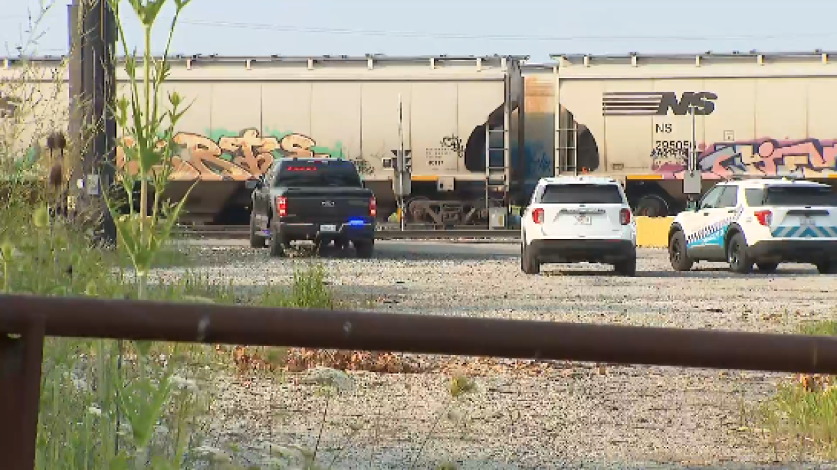Three dead after driver fleeing traffic stop careens off bridge, strikes train Three dead after driver fleeing traffic stop careens off bridge, strikes train