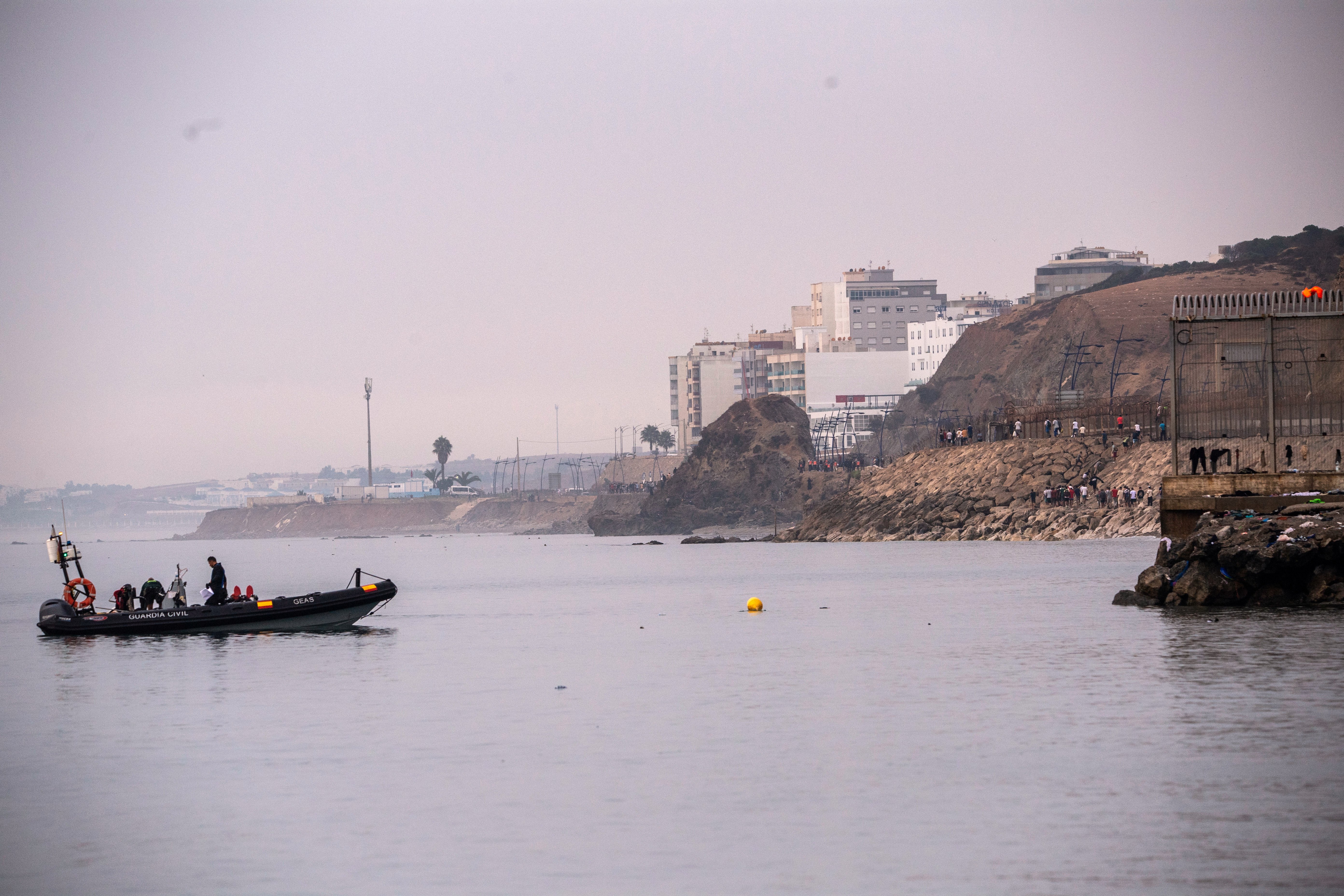 Spain installs sea barrier on Ceuta's border with Morocco after frontier rush that killed 67