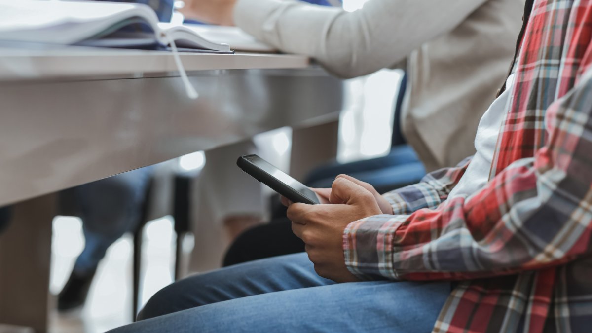 Suburban school districts cell phone ban now covers even younger students