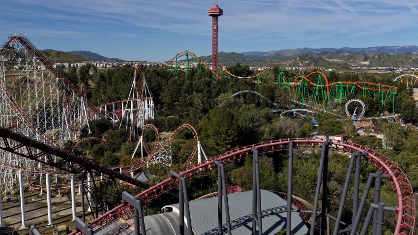 VALENCIA, CALIFORNIA – MARCH 06: An aerial view of roller coasters at Six Flags Magic Mountain on March 06, 2026 in Valencia, California. Amusement park company Six Flags announced plans to sell seven North American theme parks to EPR Properties for about $331 million as part of a plan to reduce debt and streamline operations. (Photo by Justin Sullivan/Getty Images)