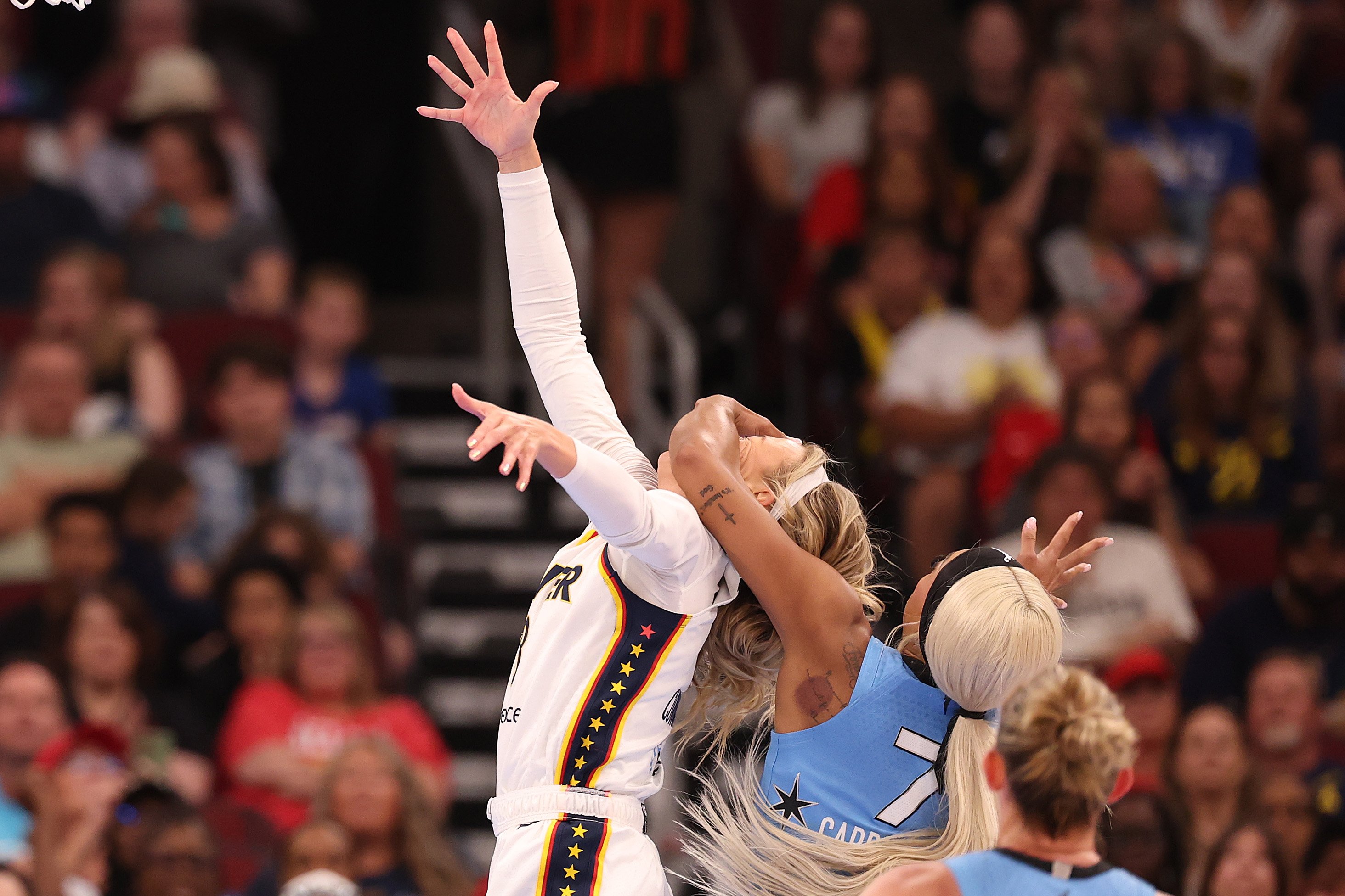 Chicago's DiJonai Carrington ejected for foul on Sophie Cunningham and posts ‘white privilege'