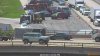 Delays on I-55 in west suburbs after rolled-over dump truck spills gravel across lanes
