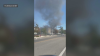 EV fire damages several vehicles in suburban high school parking garage