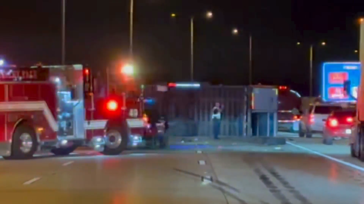 Rollover crash involving semi sends debris onto I-80, closing lanes in both directions