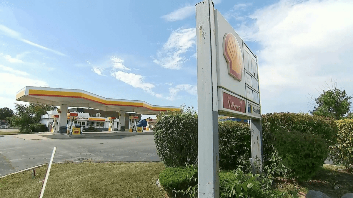 Man charged after being shot in alleged armed robbery at suburban gas station