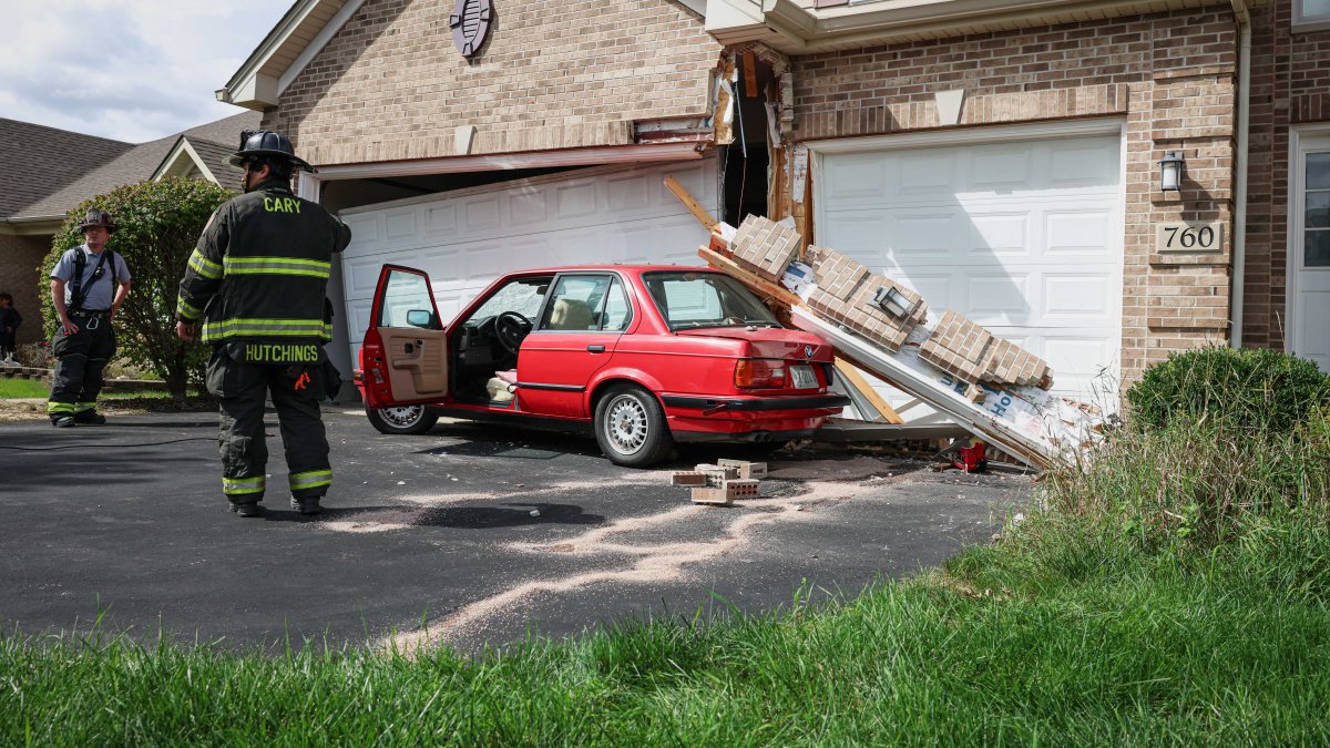 Woman uninjured after backing vehicle into suburban Cary home Woman uninjured after backing vehicle into suburban Cary home