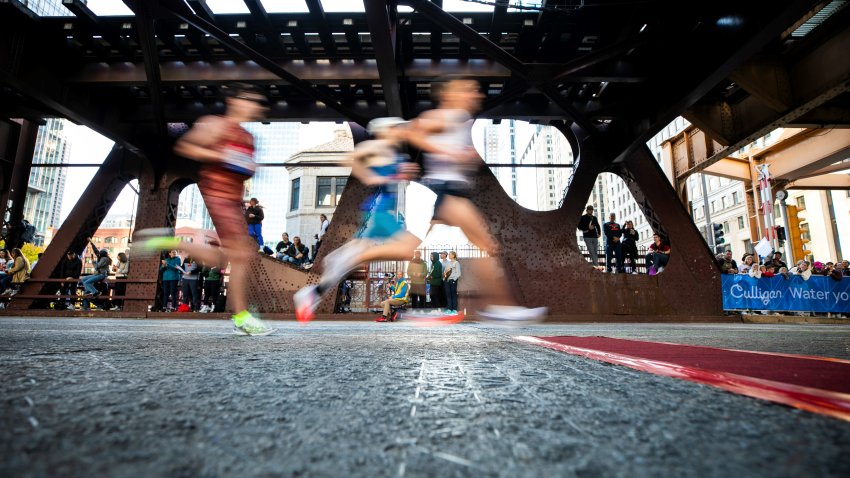 Runners compete during the 2025 Chicago Marathon in downtown Chicago, the United States, on Oct. 12, 2025. (Photo by Vincent D. Johnson/Xinhua via Getty Images)