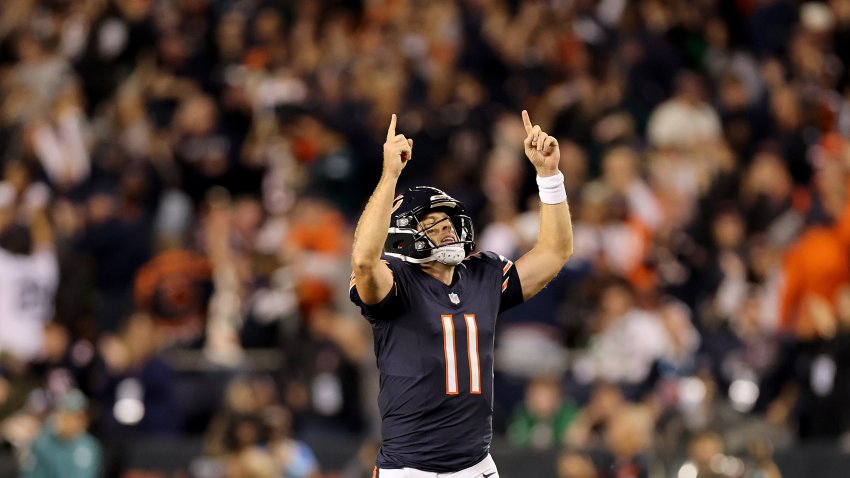 CHICAGO, ILLINOIS – SEPTEMBER 28: Case Keenum #11 of the Chicago Bears celebrates after Kalif Raymond #14 scored a 41 yard touchdown against the Philadelphia Eagles during the fourth quarter of the game at Soldier Field on September 28, 2026 in Chicago, Illinois. (Photo by Michael Reaves/Getty Images)