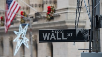 Dow Closes Above 25,000 for First Time