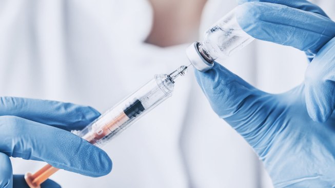 Company fires about 50 workers for refusing to get flu shot Company fires about 50 workers for refusing to get flu shot